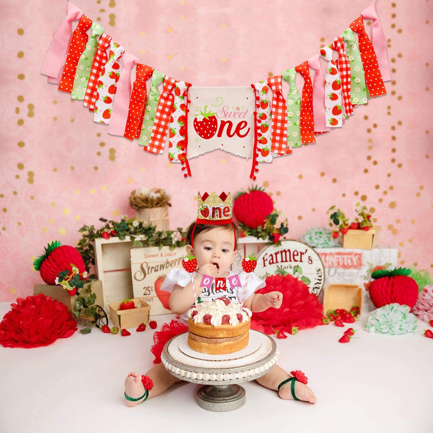second birthday of little girl. Two years old girl sitting near celebration  decorations and eating her birthday cake. Cake Smash. Stock Photo | Adobe  Stock